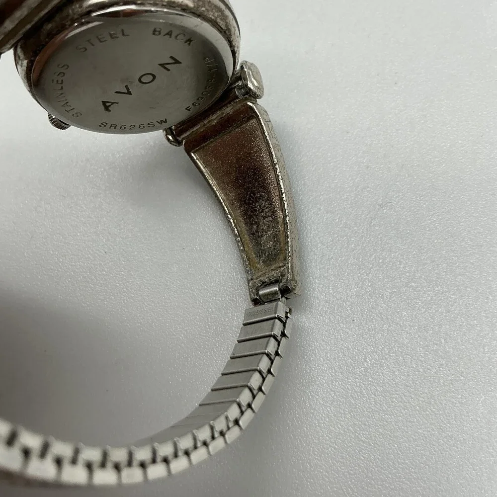 Avon F69038-1/P Women Watch 27mm Silver Tone Blue Bezel Stretch Band New Battery